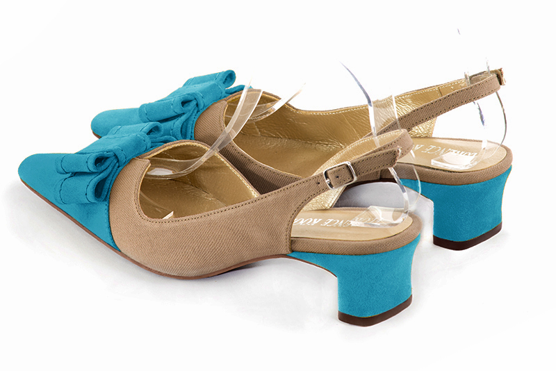 Tan beige and turquoise blue women's open back shoes, with a knot. Tapered toe. Low kitten heels. Rear view - Florence KOOIJMAN